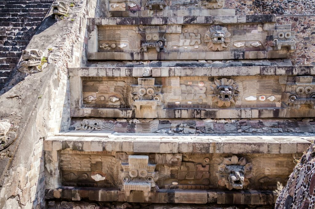 Carving details of Quetzalcoatl Pyramid at Teotihuacan Ruins - Mexico City, Mexico